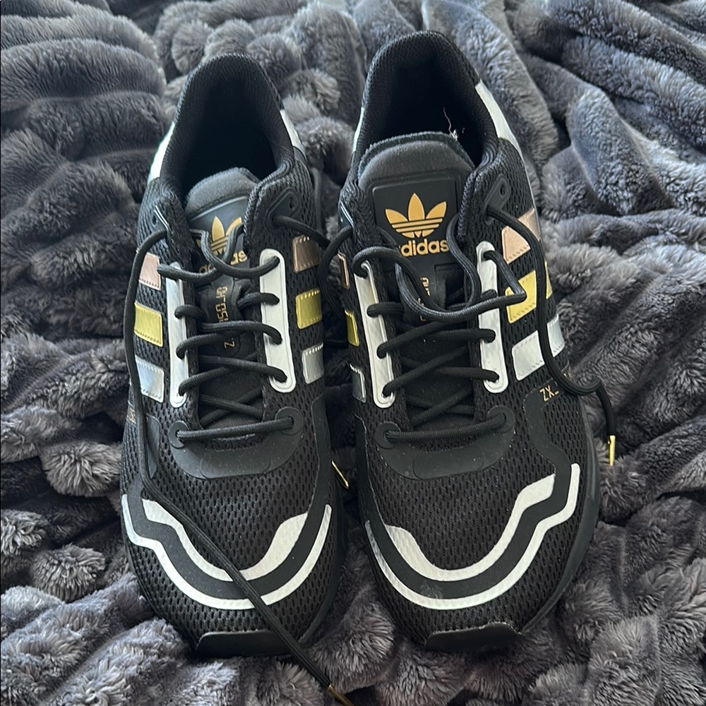 Adidas Black and Gold Retro Sneakers